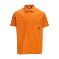 Men's orange woven short-sleeve button-up shirt with chest pockets and crest logo