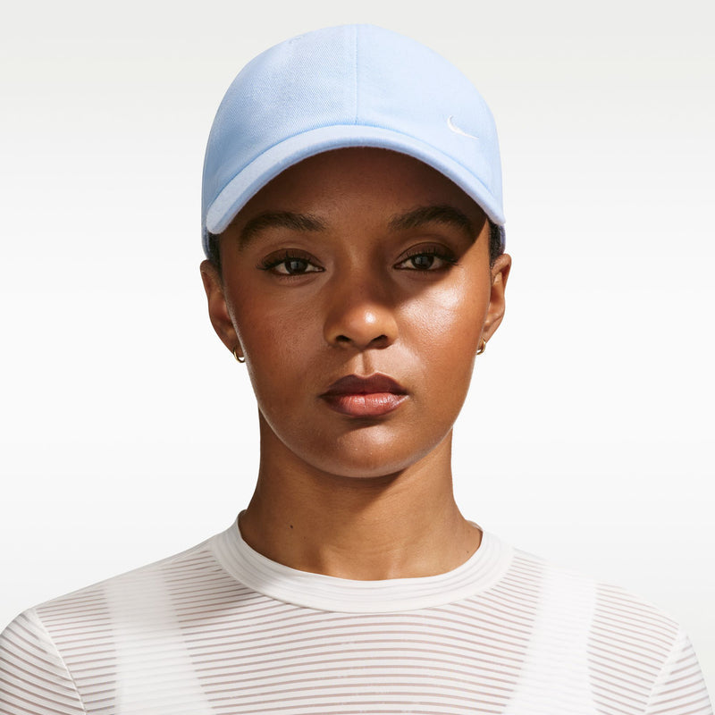 Light blue Nike Club cap front view with curved visor brim