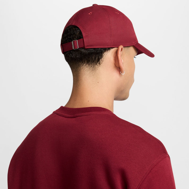 Maroon strapback cap with adjustable buckle, back/side view