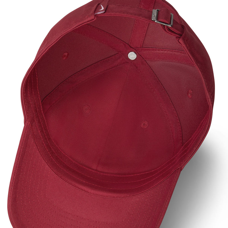 Maroon Nike cap interior panels with adjustable strap buckle