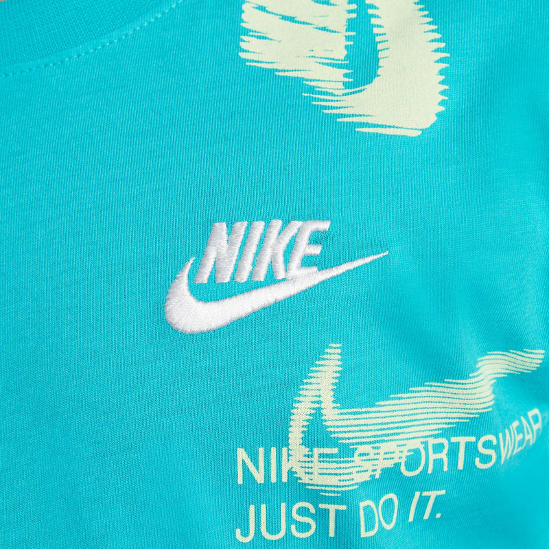 Youth turquoise T-shirt close-up with Nike logo and 'JUST DO IT'