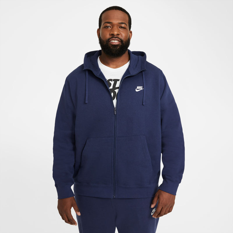 Navy zip-up fleece hoodie for men worn, with hood, drawstrings, and Nike logo on chest