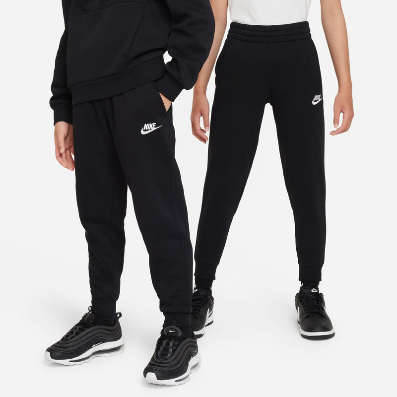 Kids black jogger pants with Nike swoosh on thigh and tapered leg openings