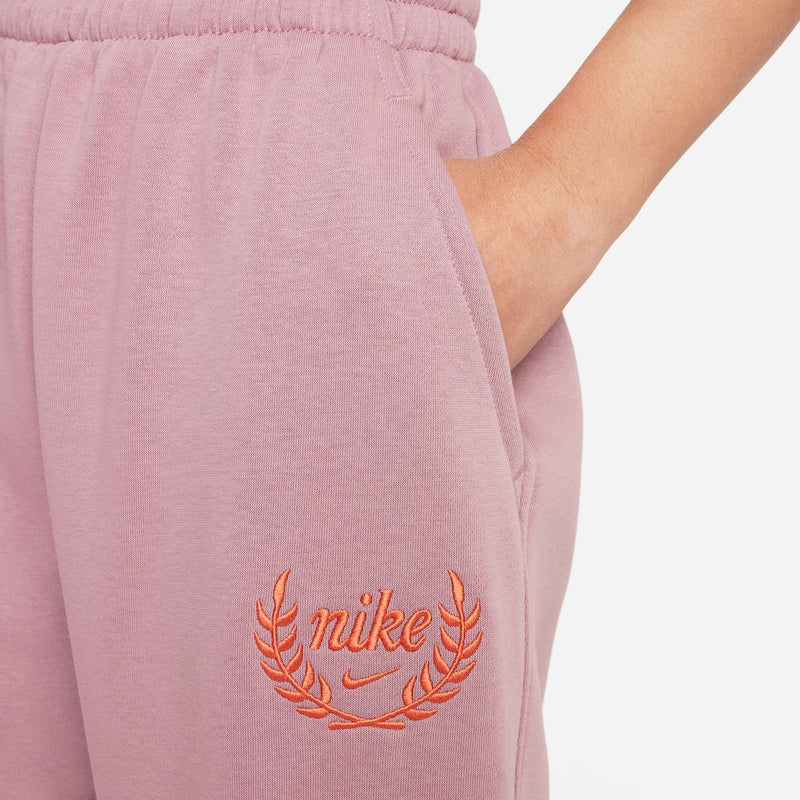 Youth plum fleece sweatpants with orange Nike laurel graphic on the thigh