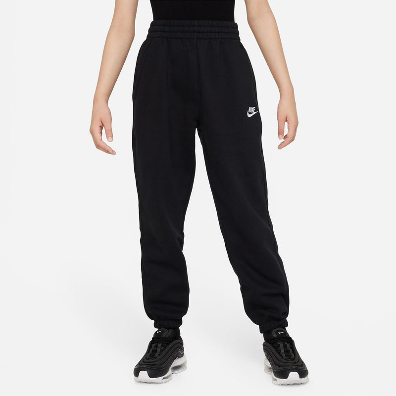 Youth black loose sweatpants with drawstring, tapered legs, and Nike logo on thigh