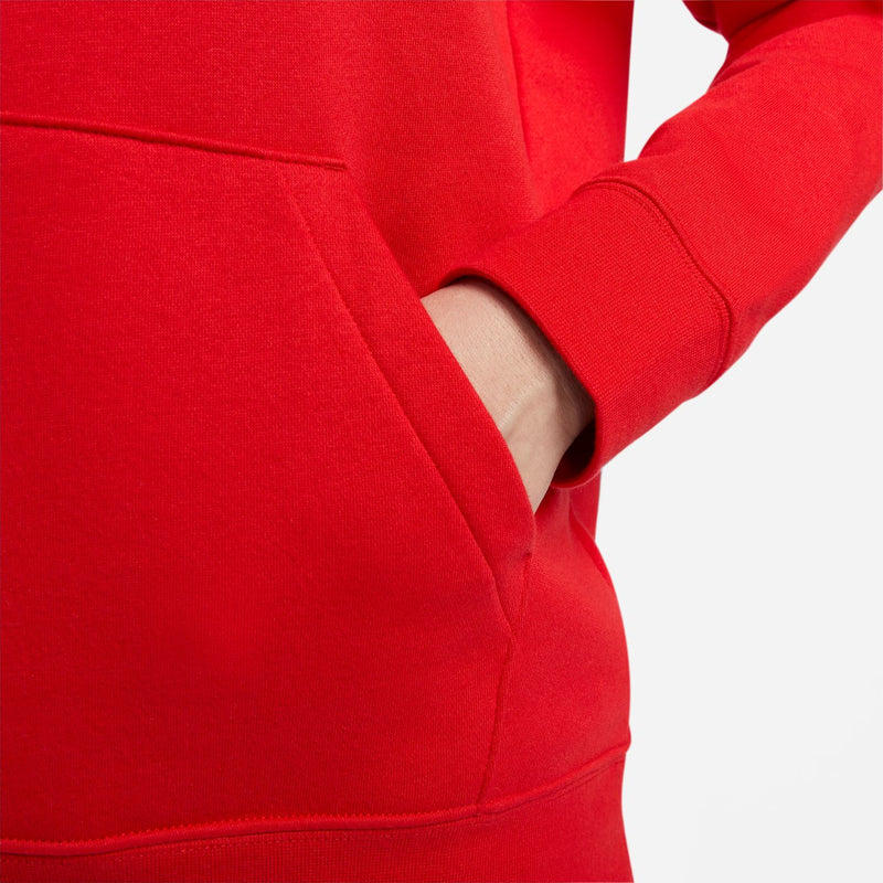Red fleece hoodie sleeve cuff and kangaroo pocket seam detail