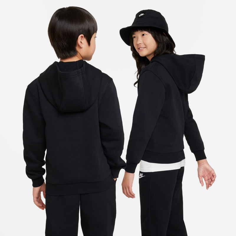 Youth black fleece pullover hoodie with hood, back view worn by child