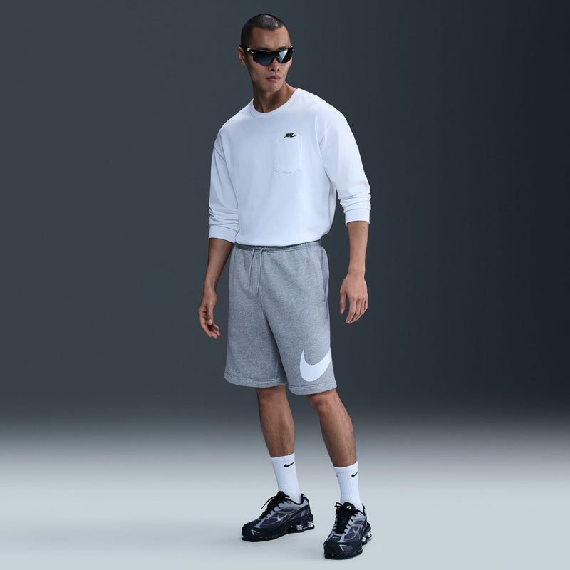 Mens grey fleece shorts worn with long sleeves; white logo on front hem