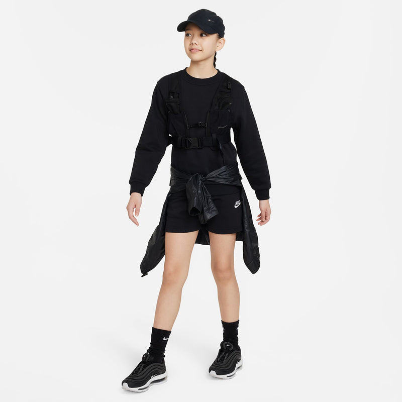 Black youth french terry shorts on model, elastic waistband, Nike logo
