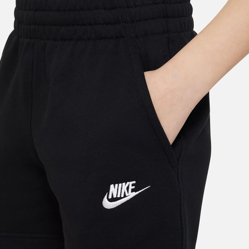 Black youth shorts detail with stitched seam and white Nike swoosh logo