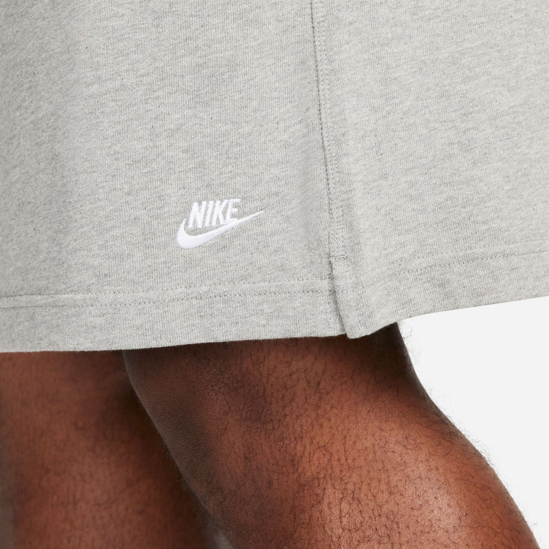Heather grey knit shorts with Nike logo near hem and drawstring seam