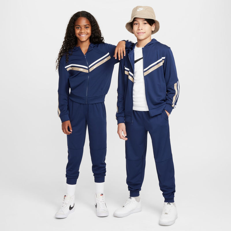 Youth navy matching jogger set: side stripes on tapered pants with ribbed cuffs.