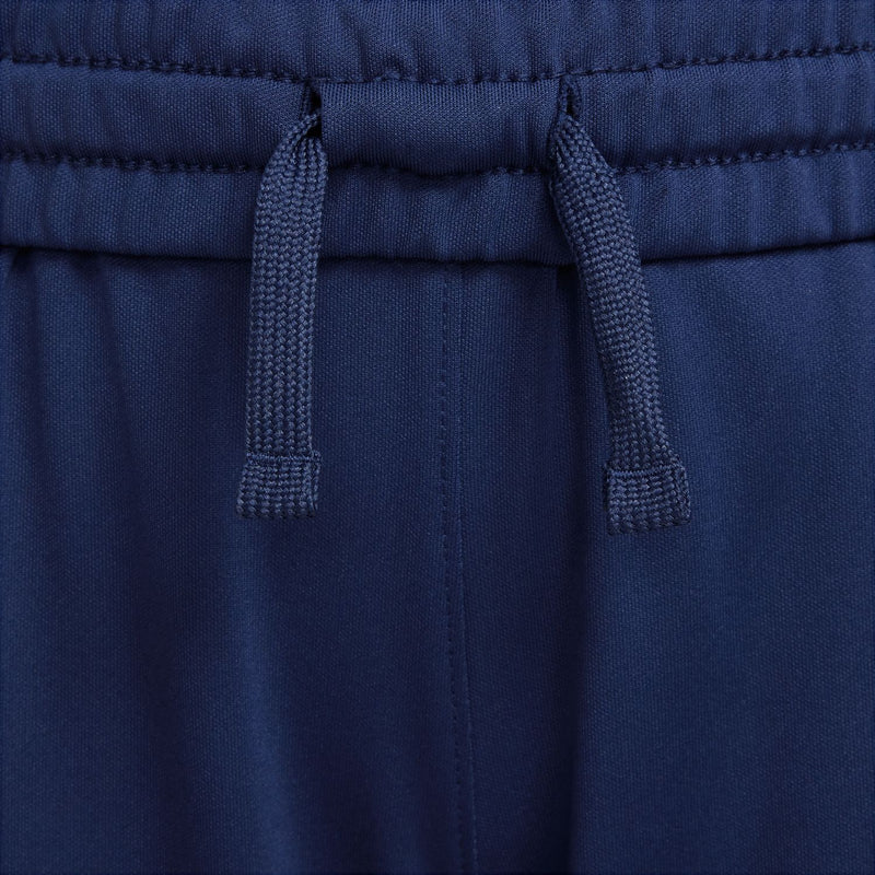 Close-up of youth navy joggers with elastic waistband and drawstring tie.