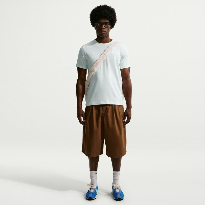 Men's mint green short-sleeve club T-shirt with small Nike logo, worn front view