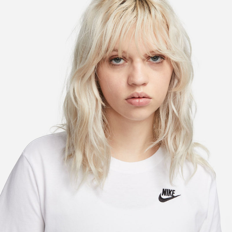 Women's white Nike T-shirt close-up with crew neck and black Nike logo