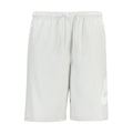 Men's white woven shorts with elastic waist and drawstring