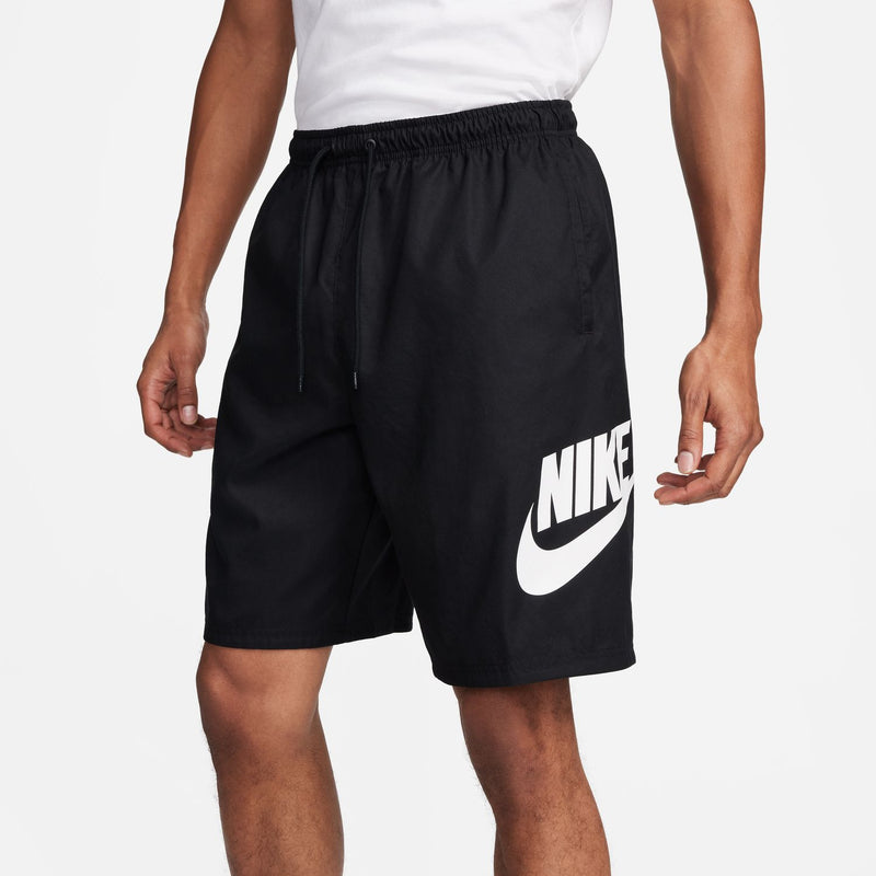 Men's black woven shorts with Nike logo on side panel and elastic waistband