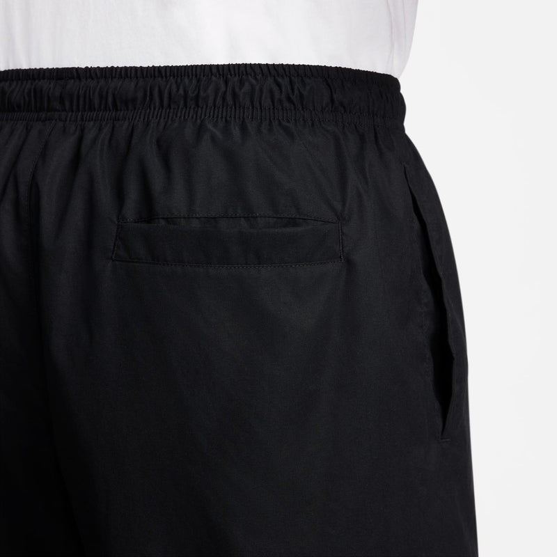 Men's black woven shorts back view with pocket seam and elastic waistband