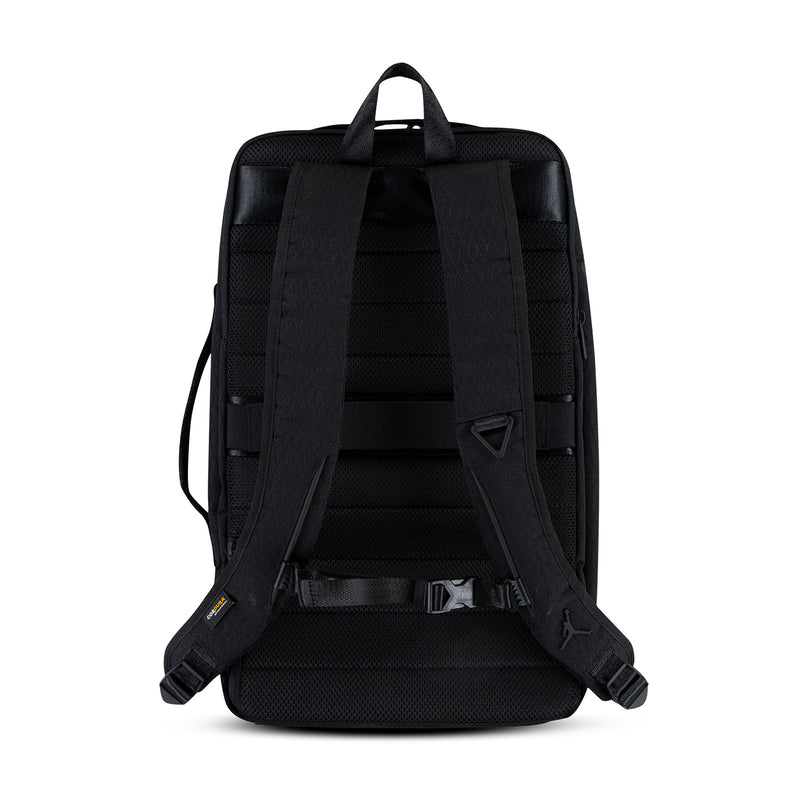 Black backpack back view with padded panel and adjustable shoulder straps