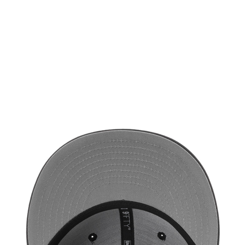 Gray cap underside with stitched panels and inner logo detail