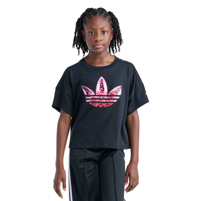 Youth black crewneck T-shirt with pink confetti trefoil logo on the chest