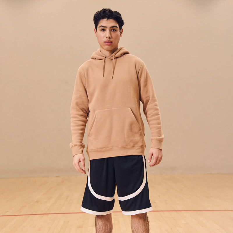 Men's contrast tape shorts, dark with bold white tape panels around the lower legs