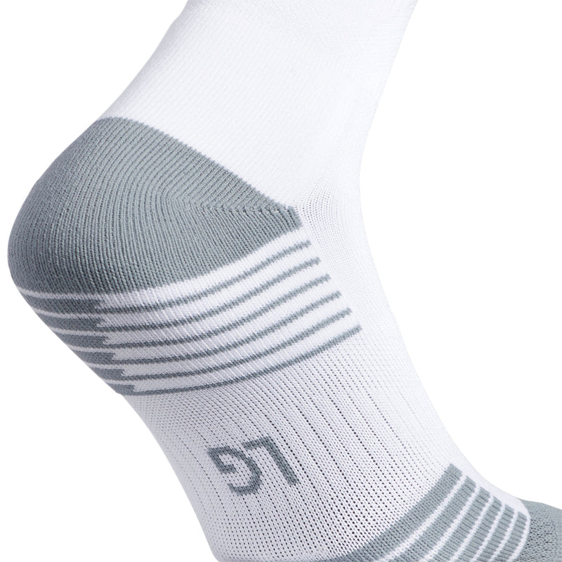 White crew sock with gray heel panel and striped traction pattern