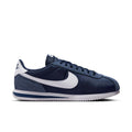Men's Cortez low-top sneakers in navy and white; lace-up front and swoosh