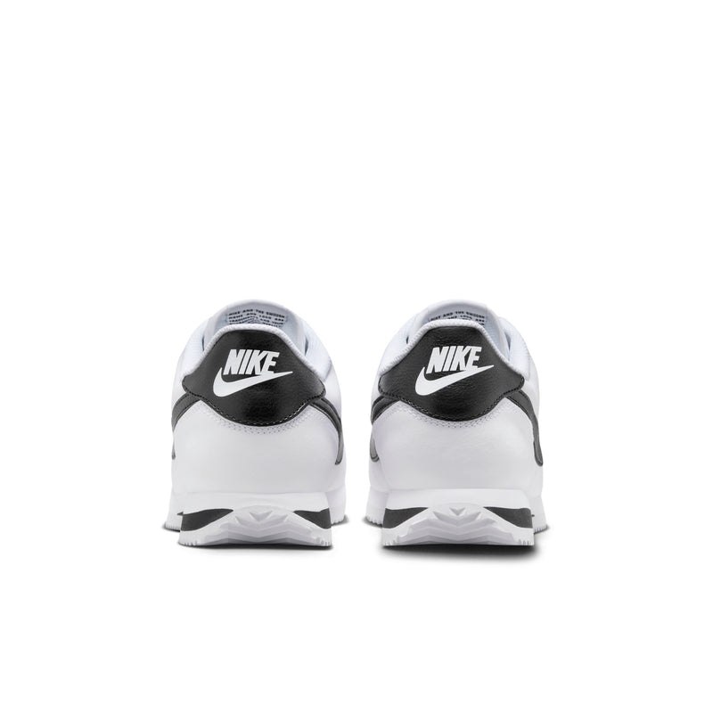 White men's low-top sneakers, rear angle with black Nike heel logo and side panels