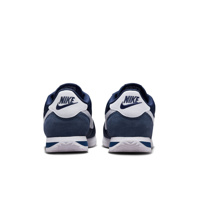 Men's Cortez sneakers rear view in navy; white heel panel and stripe details
