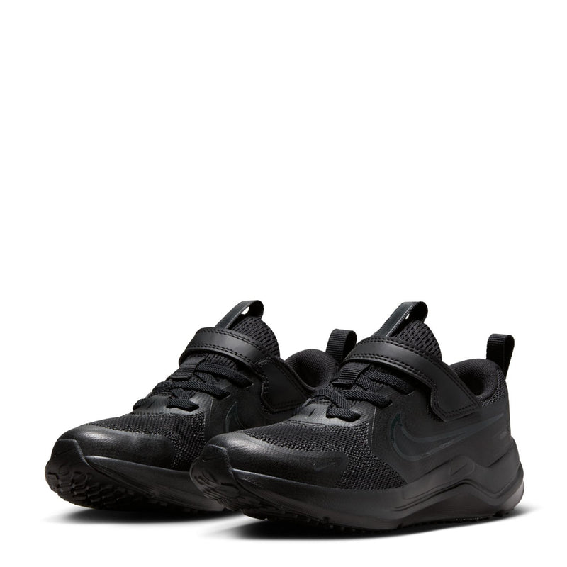 Pair of kids black running shoes with hook-and-loop strap and laces