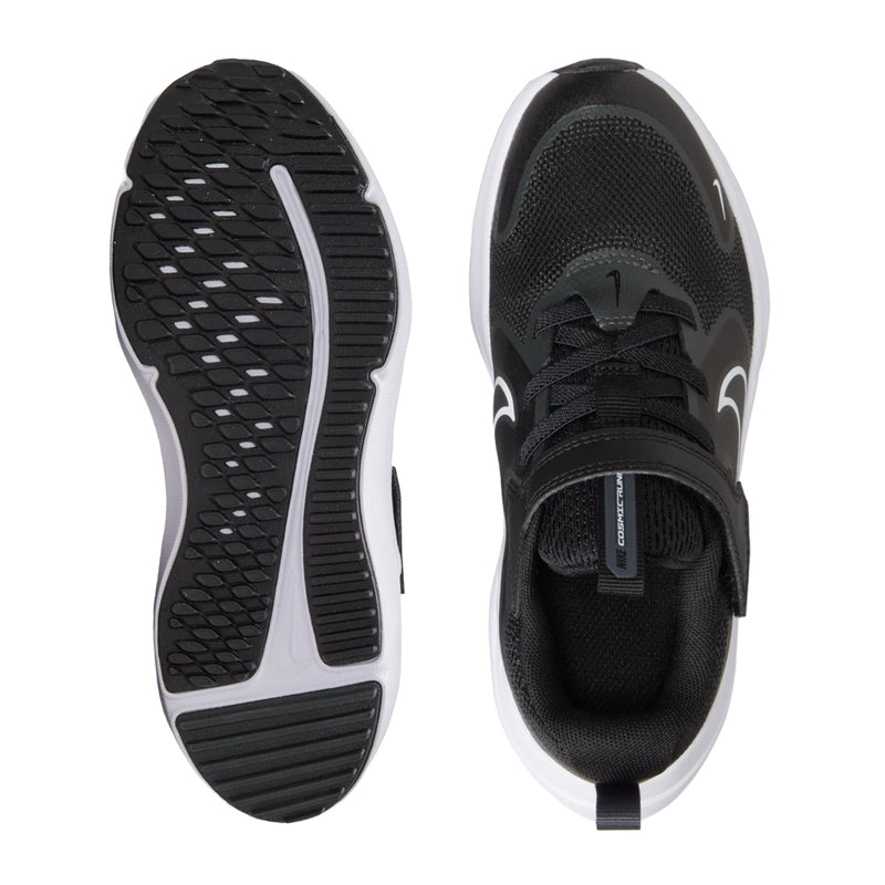 Kids black-and-white sneaker soles with textured tread and sidewall grip