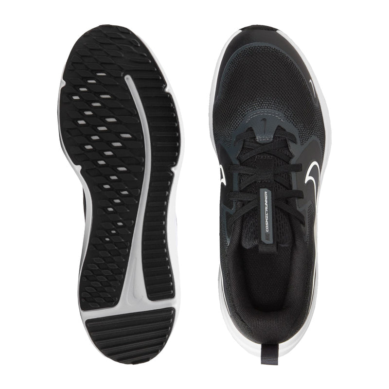 Youth black running shoe outsole with textured tread and matching lace-up upper