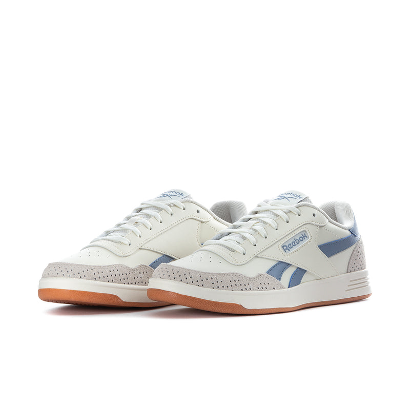 Men's Reebok court sneakers side view, white uppers with light blue stripes