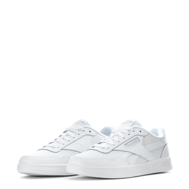 Women's white low-top sneakers, pair front view with lace-up and padded collar