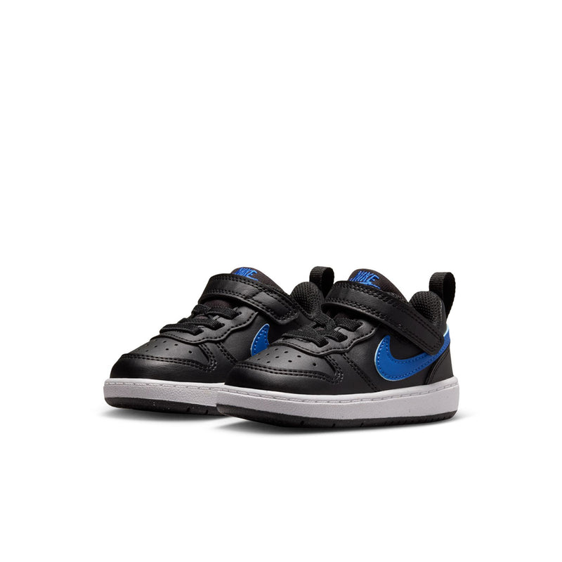 Kids' black low-top sneakers with blue accents and white midsole, velcro closure