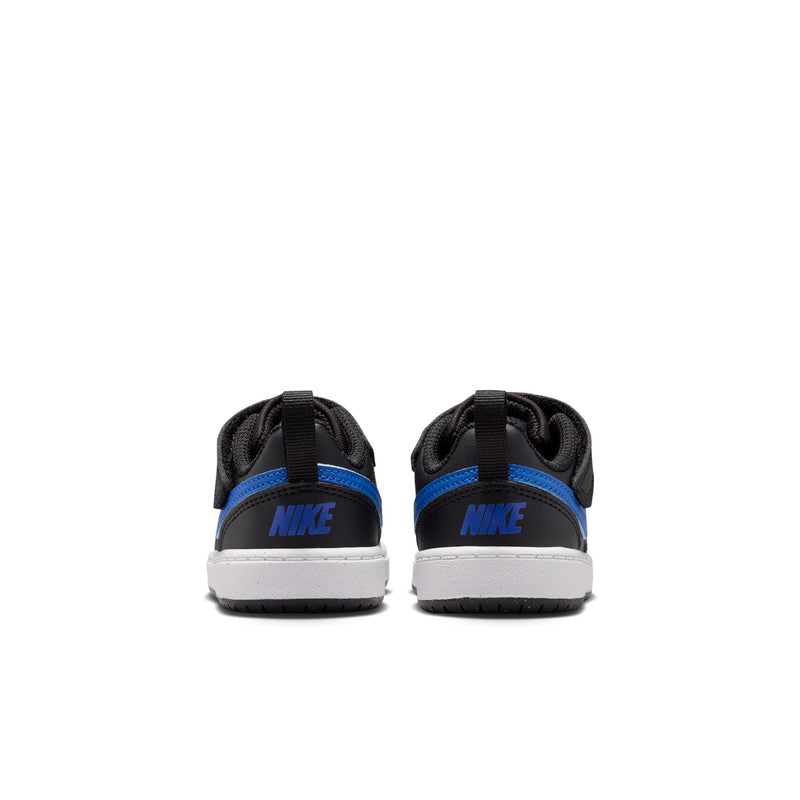 Kids' black low-top sneakers with blue heel logo, white midsole, velcro strap