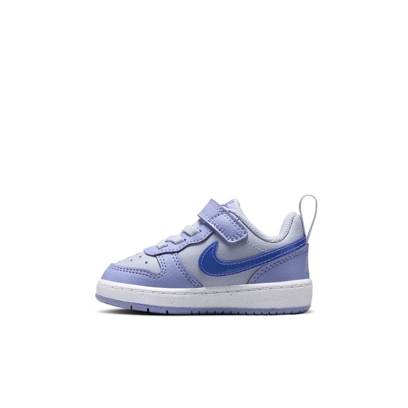 Toddler low-top sneakers with light purple leather and blue swoosh, hook-and-loop strap