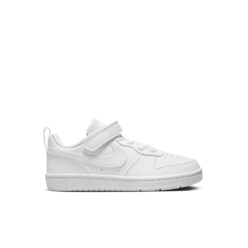 White kids low-top sneakers, side profile with hook-and-loop strap