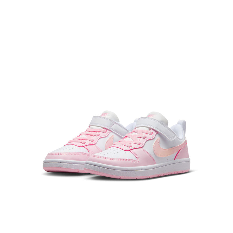 Kids low-top sneakers, side view in white with pink accents and hook-and-loop strap