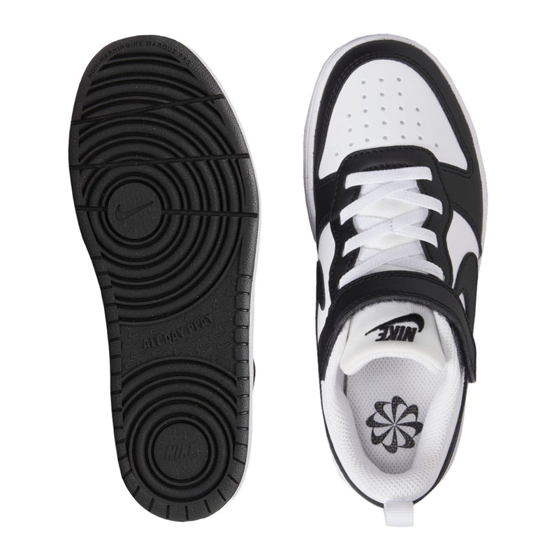 Kids low-top sneakers soles and uppers, black tread and white toe with black strap