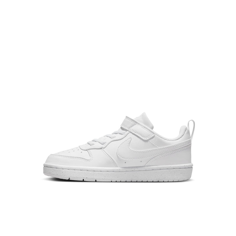 White kids low-top sneakers, angled side view with swoosh logo