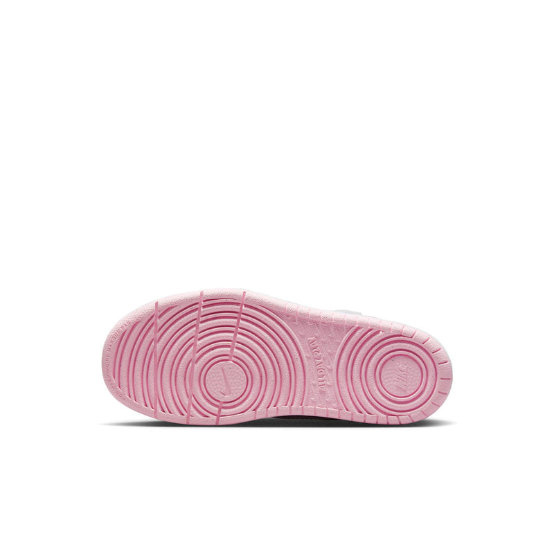 Kids sneaker outsole in light pink with circular traction pattern