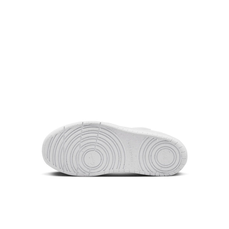 White kids sneaker outsole tread, side view
