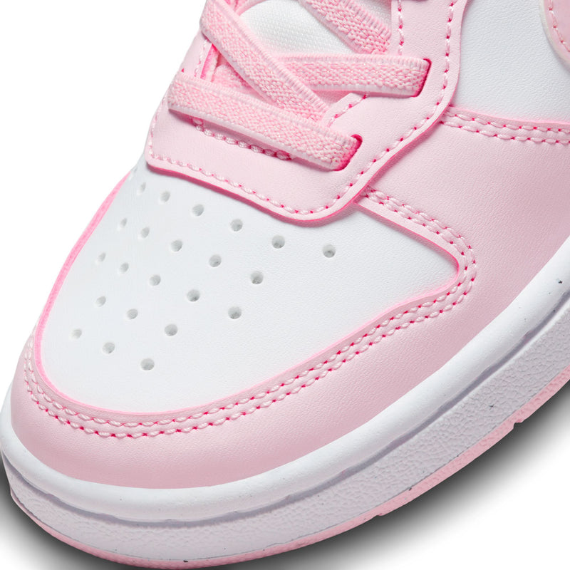 Kids sneaker upper close-up in white and light pink with stitched details and perforations