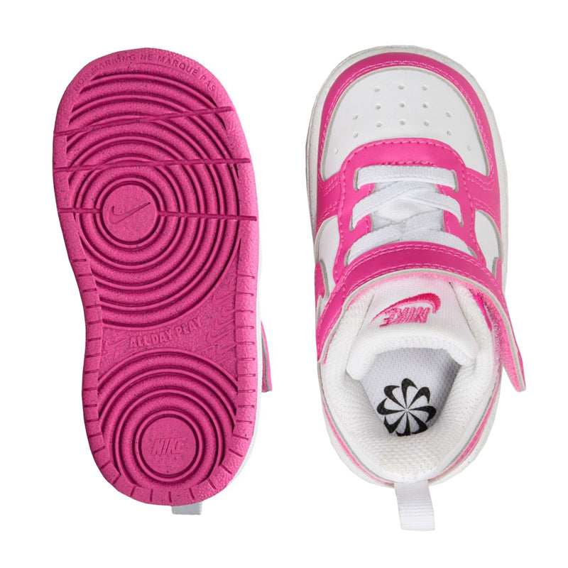 Toddler sneaker soles: pink rubber outsole and white insole with fuchsia strap detail.