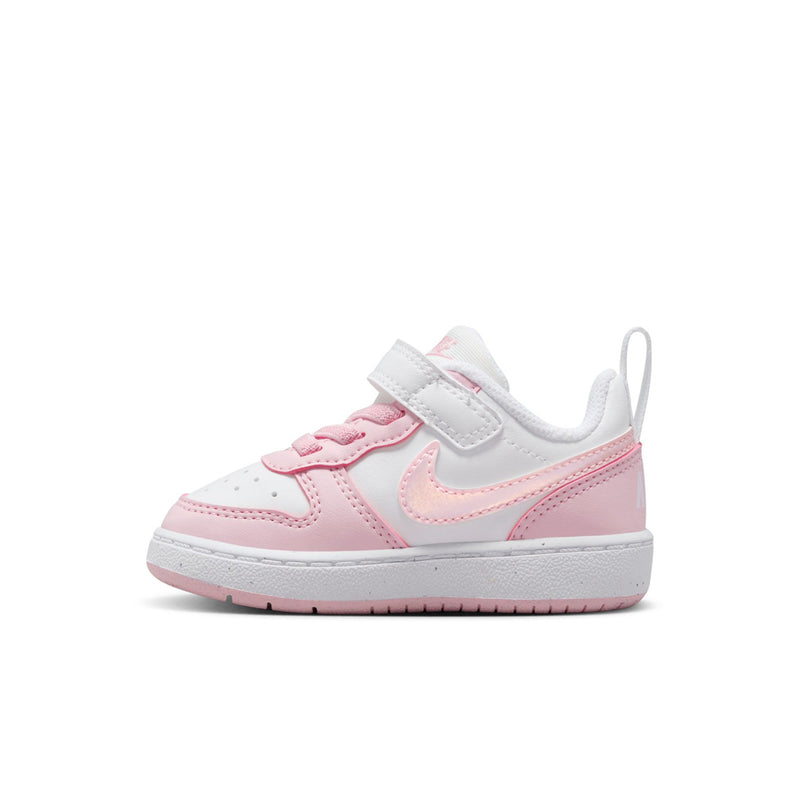 Toddler low-top sneakers, pink and white colorblock with hook-and-loop strap and sole.