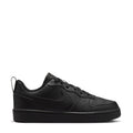 Youth low-top sneaker in black with lace-up front and Nike swoosh on the side.