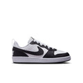 Youth low-top sneakers in white and black with swoosh logo and lace-up design