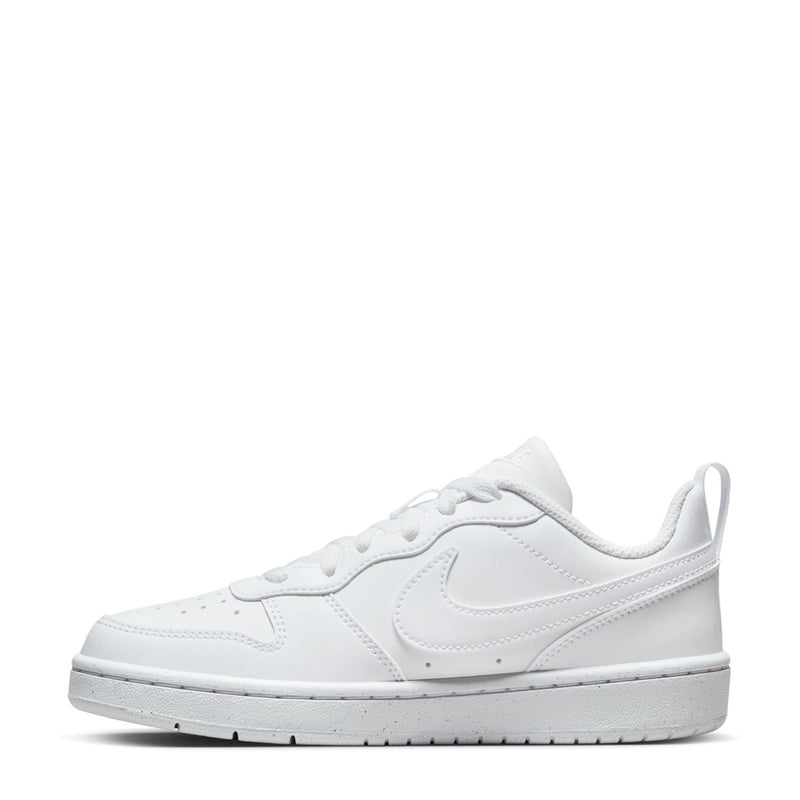 Youth white low-top sneaker, front three-quarter view, lace-up